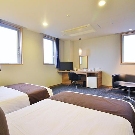 Kiryu Grand Hotel Habitación foto
